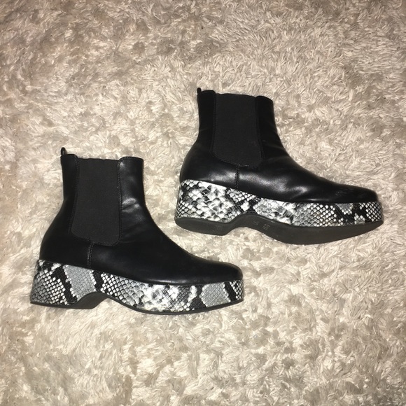 Urban Outfitters Shoes - snakeskin platform black booties